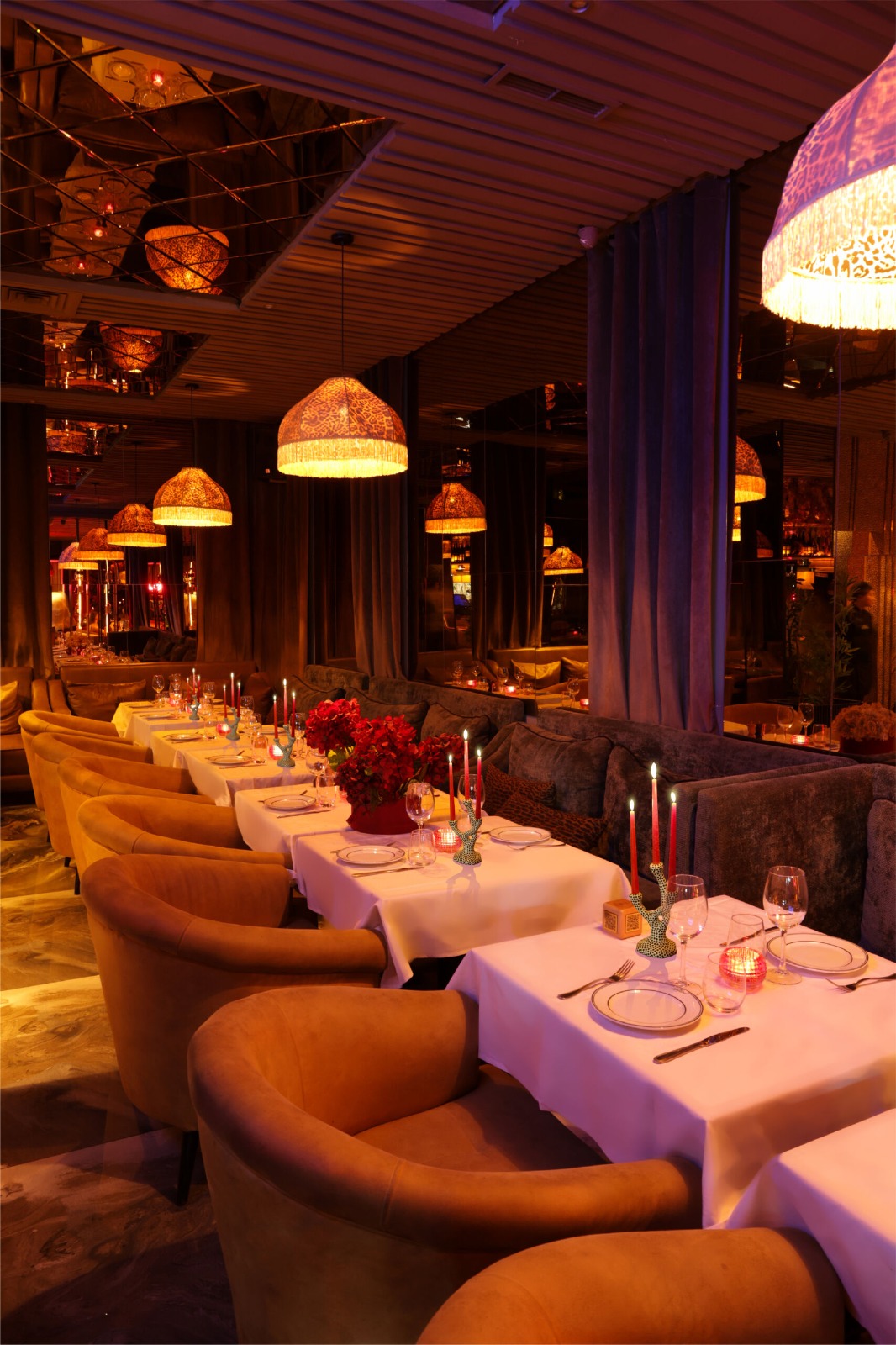 Luxury rooftop restaurant in Marrakech with panoramic views and elegant table setting